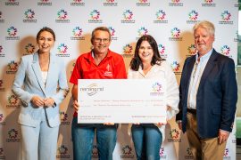 Nerang Celebrates organisers receiving a Community Fund cheque from Nerang RSL to support fireworks and event logistics for the 2025 Christmas celebration.