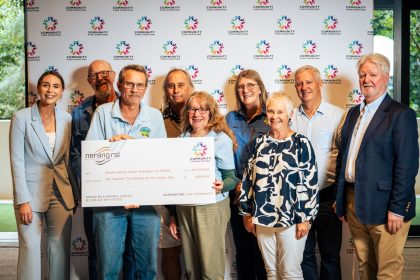 Nerang Country Garden Association members receiving Community Fund support from Nerang RSL to purchase a defibrillator for their vibrant garden space.