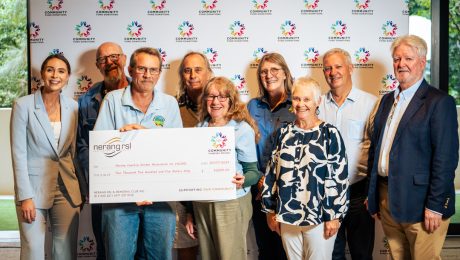 Nerang Country Garden Association members receiving Community Fund support from Nerang RSL to purchase a defibrillator for their vibrant garden space.