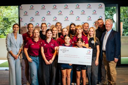 Committee members, volunteers and junior players from Nerang RSL Hino Touch Football Club holding their Community Fund cheque at Donation Day on Sunday 20 July 2025.