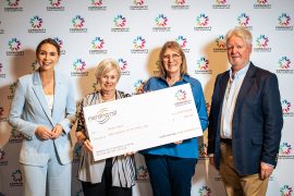 Representatives from Sheila’s Shack Nerang at Community Donation Day, proudly accepting their community funding cheque.