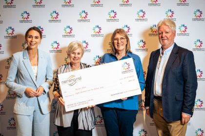 Representatives from Sheila’s Shack Nerang at Community Donation Day, proudly accepting their community funding cheque.