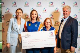 Representatives from Broadwater Dragons Paddling Club accepting a Community Fund cheque at Nerang RSL during Community Donation Day on 22 July 2025.
